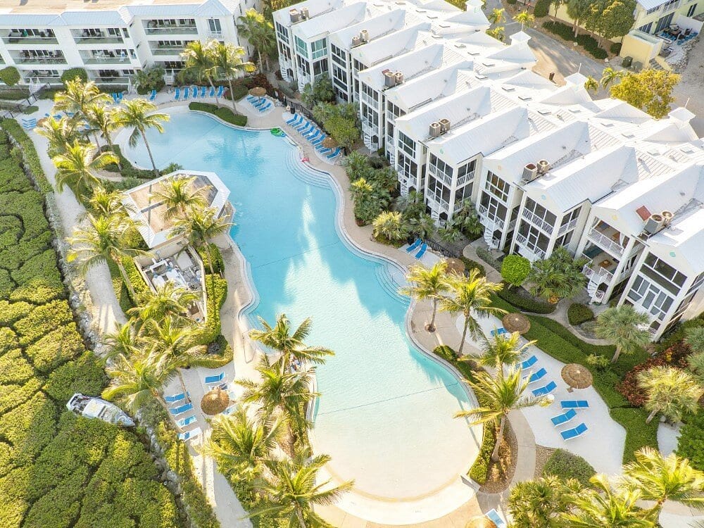 Mariner's Club pool framed by tropical palms